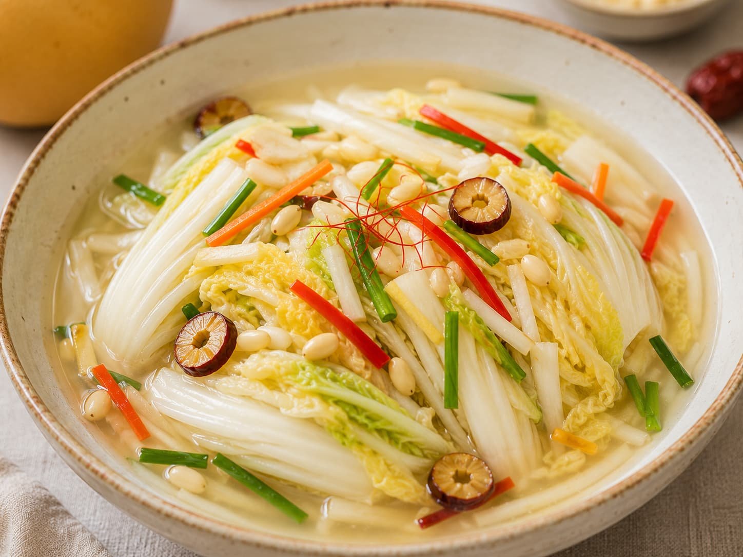 White kimchi (baek kimchi), pale napa cabbage kimchi stuffed with fruit and nuts